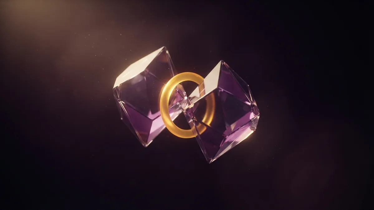 Faceted glass forms joined by an amber ring, reflecting startup traction and team expertise